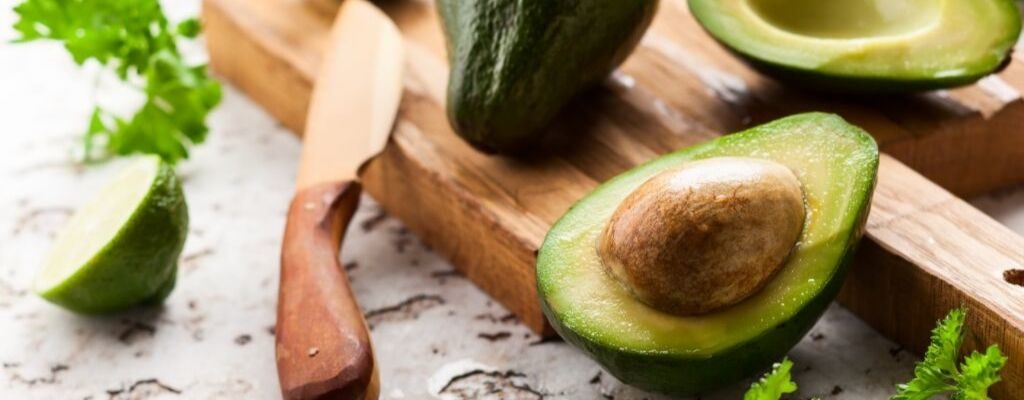 avocado cut in half with seed