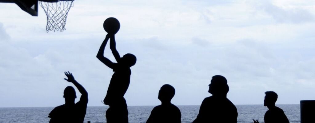 group of guys playing basketball