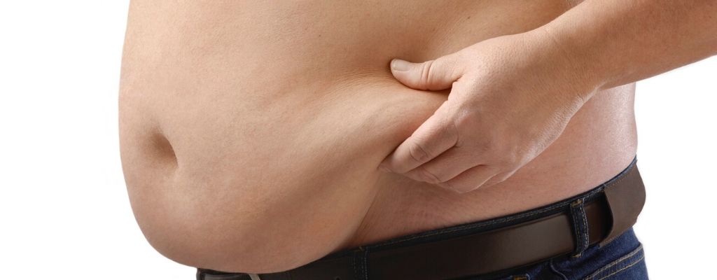 male pinching belly fat